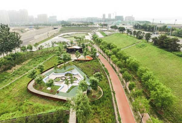 GREEN BELT DEVELOPMENT ON DIVIDER STRIP, INTERSECTIONS AND ROUNDABOUTS OF HIGHWAY